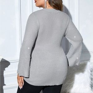 Pearl sleeve sweater
